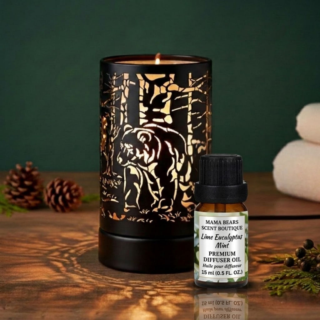 Diffuser oil/wax warmer and diffuser oil bottle on a wooden surface with a green background