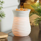 Brazilian Beach Vibes Wax Melt Cubes in a white wax warmer.