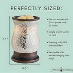 Electric warmer with dimensions and features on a light green background