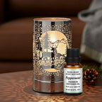 Decorative diffuser oil/wax warmer with cut-out design and a bottle of Mama Bear's Scents Boutique peppermint diffuser oil on a wooden surface.