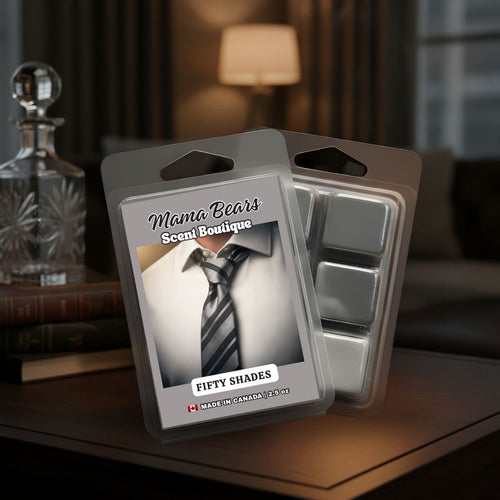 Fifty Shades Packaged wax melts with a label featuring a man wearing a tie on a wooden surface.