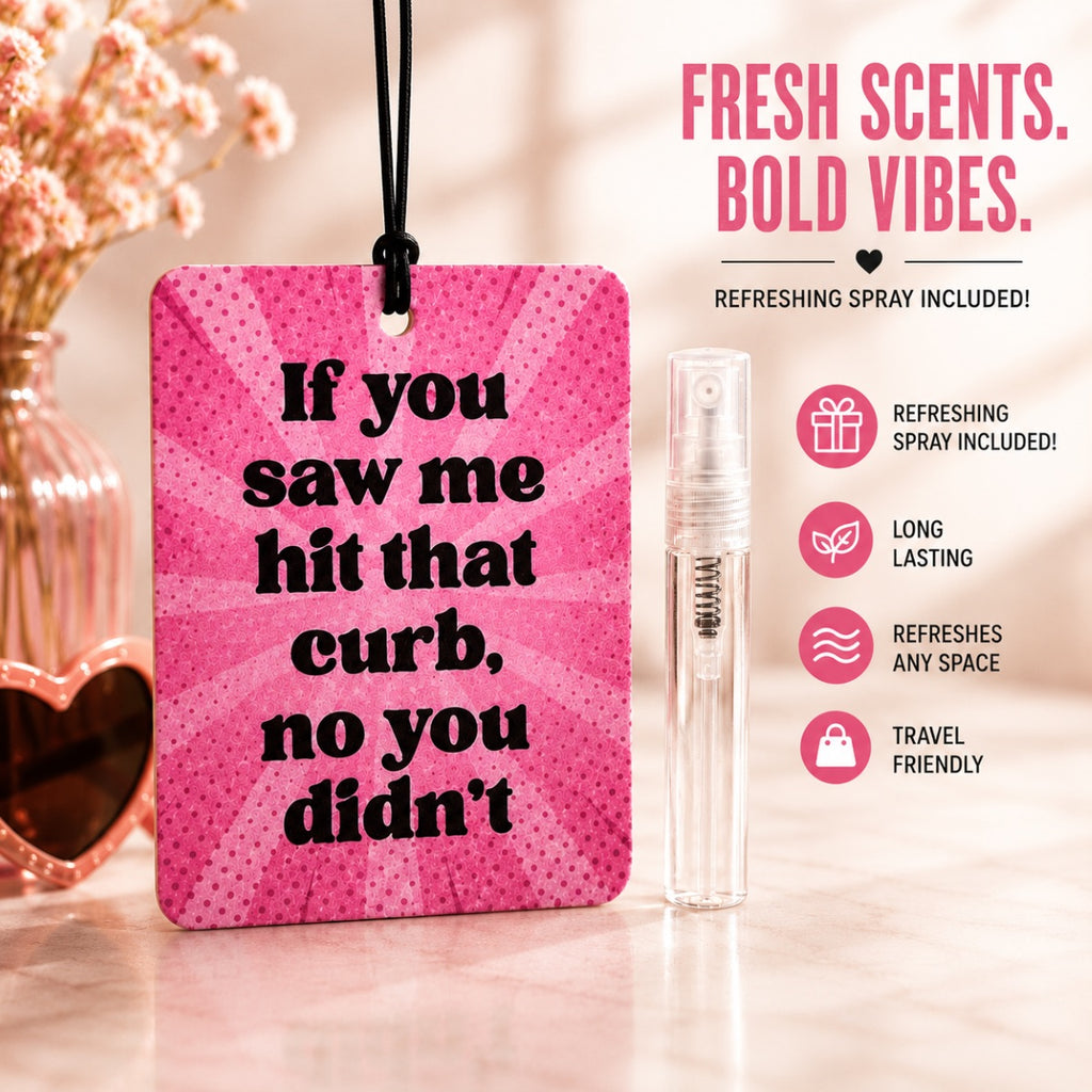 Pink air freshener with humorous text and refreshing spray on a blurred background