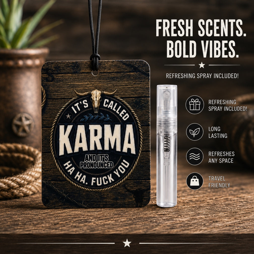 A car air freshener tag with a black cord, featuring a circular emblem that reads 'IT'S CALLED KARMA HA HA. FUCK YOU'.