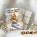 Mama Bears Scent Boutique wax melt packaging with a bear illustration of a mama and baby and 'Nursery Snuggles' text, surrounded by decorative elements.