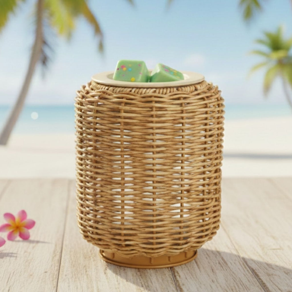 Brown wicker wax melt warmer styled with a beach view.