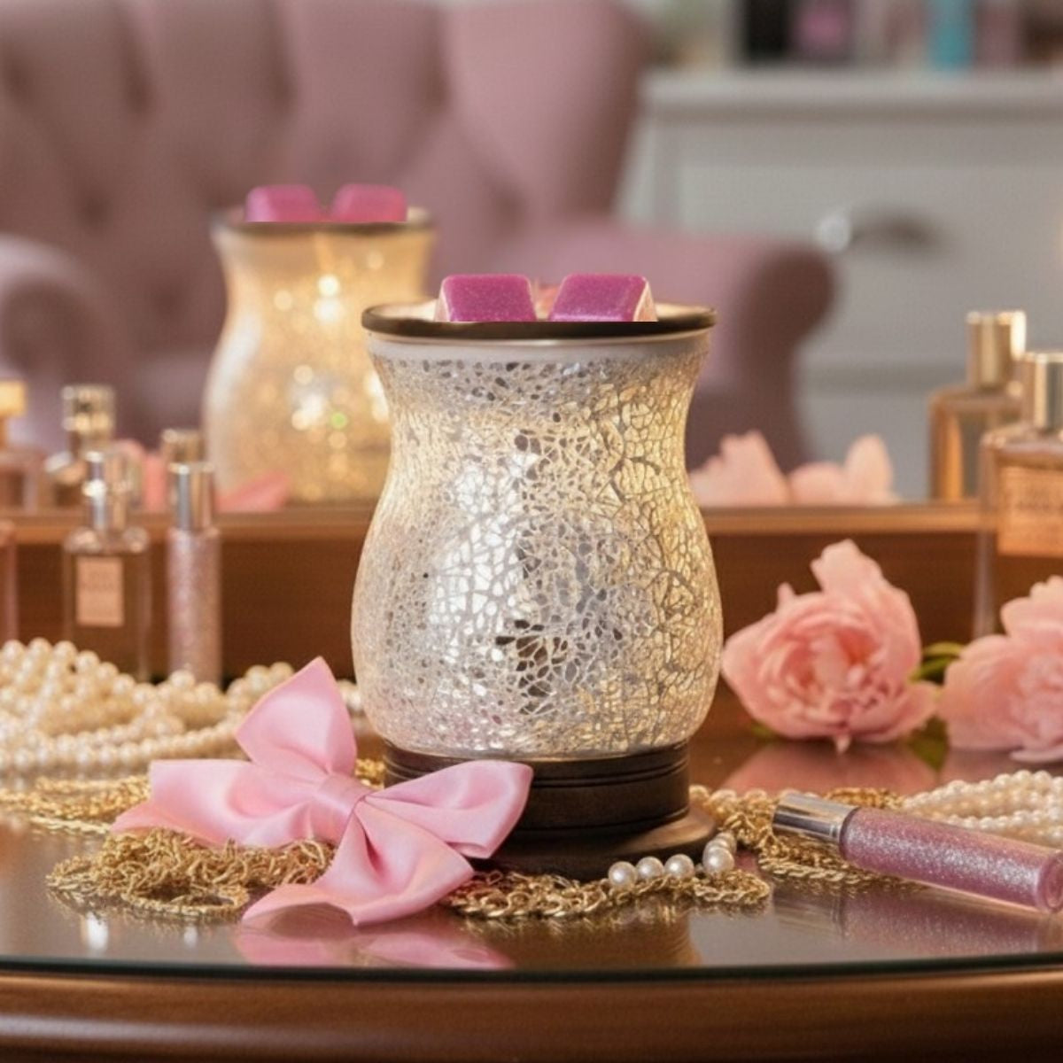 Two Viva glam wax melt cubes in a crackled mirrored glass wax warmer.